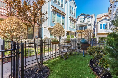 View of gated front patio area which has been turf