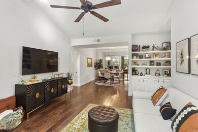 Beautiful wood floors and built ins bring an eleva