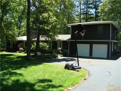 Front of this painted popular home with 5 bedrooms and 3 full baths