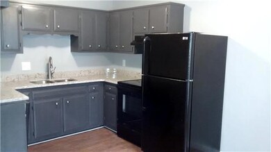 Check out this kitchen! Newly painted cabinets (color is a little off- they are a cool grey,) gorgeous white marbled granite and brand new appliances! You will LOVE it! Not pictured is the eat in area of the kitchen that flows into the living room!