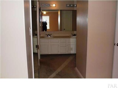 The master bath features a double vanity