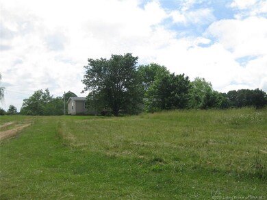 View of home (about 2/3 of the way up driveway