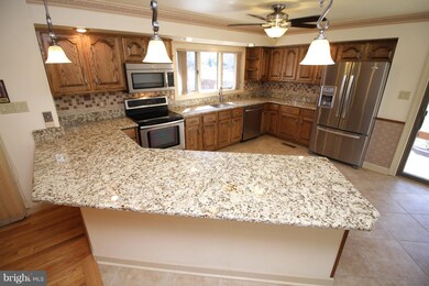 14715 Wisteria Dr, Swan Point, MD 20645 - photo 4