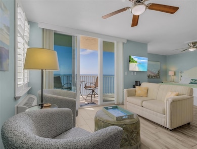 Open L-style floor plan makes the most of the space.  Beachwood look porcelain tile..easy care.  IMPACT WINDOWS too!