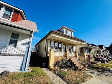 12140 Mitchell St, HamtraMcK, MI 48212 - photo 2