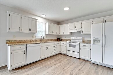 New granite, painted cabinets and new dishwasher