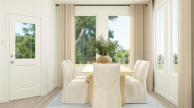 Dining space featuring light hardwood / wood-style