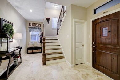 Beginning with the spacious entrance and foyer are