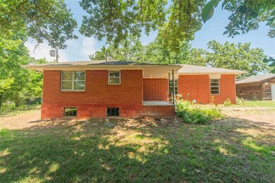 View of front of house with a front yard
