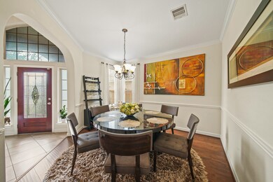 Entryway opens up to a formal dining room