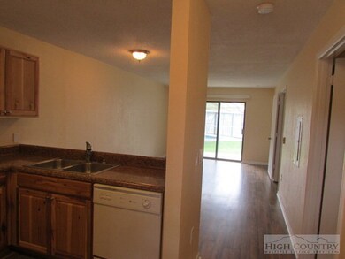 Upon entering unit, you will find the kitchen to y