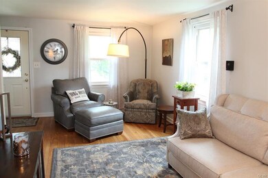 Spacious Living Room with hardwood floors