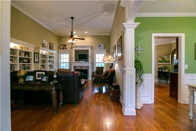 Welcome Home!  This Home is stunning and Look at your Stone Fireplace and your built-ins with Hardwood Floors, plenty of room for the family!