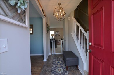 Updated flooring, light fixtures, welcoming entryw