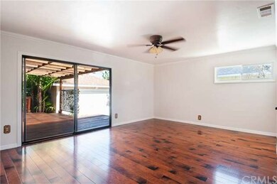 The Living Room opens to the covered deck, adding 