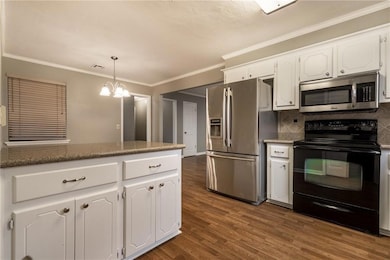 Kitchen featuring appliances with stainless steel 