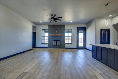 Unfurnished living room with light wood-type floor