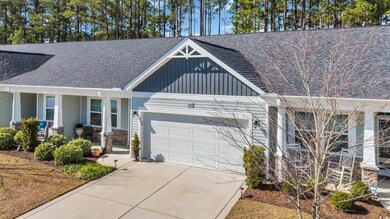 View of front of home featuring covered porch and 