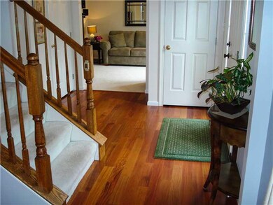 Entry/Foyer. Gorgeous Santos Mahogany hardwood flo