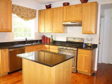 Kitchen. OPEN KITCHEN WITH VIEW OF WOODED BACKYARD