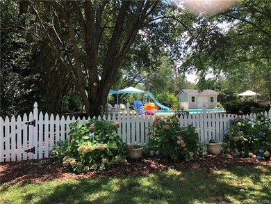 looking through fence towards pool.