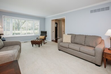 Huge Living room with bay window and pocket doors 