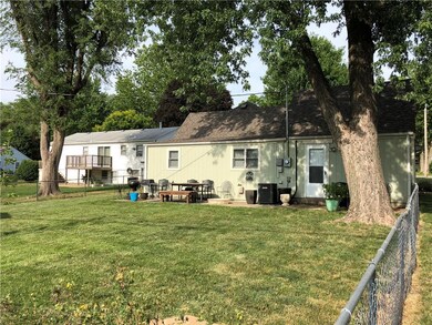 Large manicured Fenced in back yard for entertainm