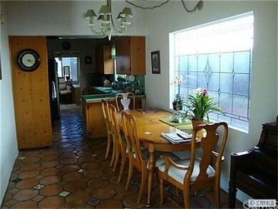 Separate eating area with stained glass window