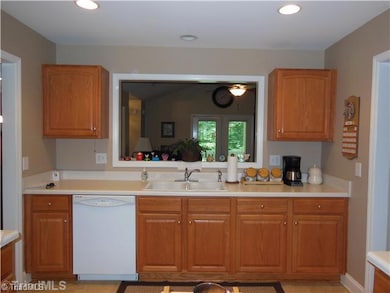 Kitchen. Kitchen has open pass through to Living Room