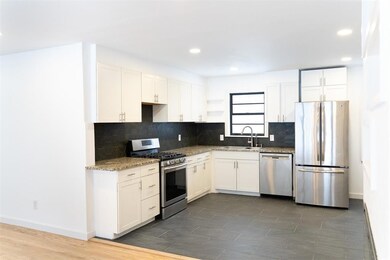 Fresh and modern kitchen with stainless appliances