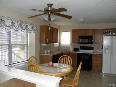 Open floor plan with at-in kitchen