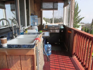 front deck used as kitchen area