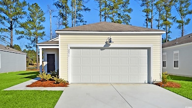 Garage with a lawn