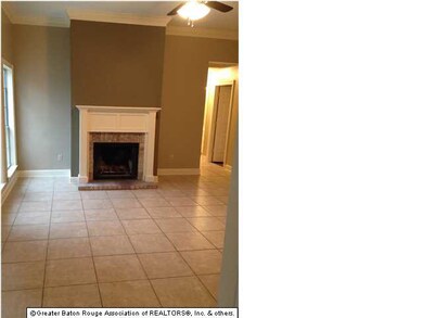 Living room with high ceilings and fireplace