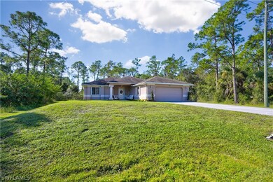 129 Greenbriar Blvd, Lehigh Acres, FL 33972 - photo 2
