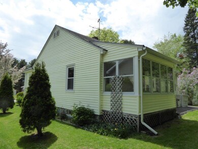 enclosed sun porch in the back