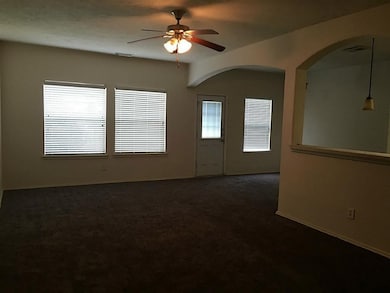 Large living room opens to kitchen and dining room