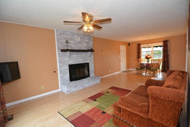 Beautiful white washed gas fireplace.