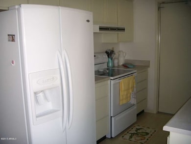 KITCHEN WITH SIDE BY SIDE FRIDGE