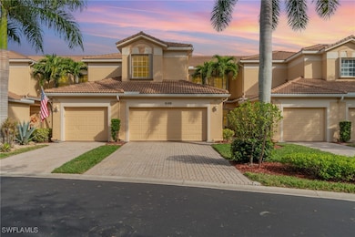 Mediterranean / spanish-style house with stucco siding, decorative driveway, a garage, and a tiled roof