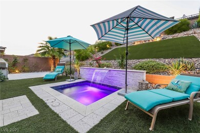 Built-in oversized spa with waterfall