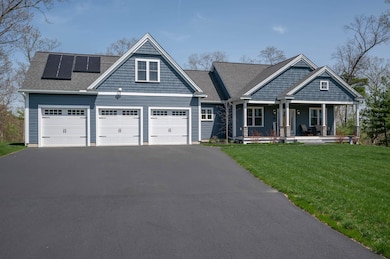3 Car Garage and Farmers Porch