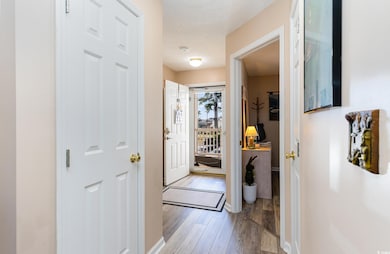 Hall featuring light hardwood / wood-style floors 