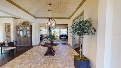 Formal foyer with shiplap ceiling and tile inlay f