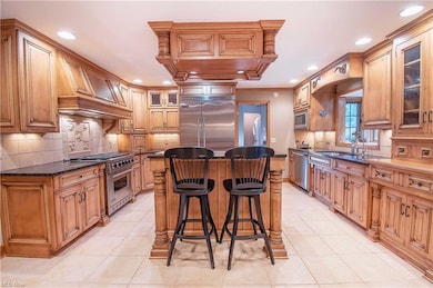 This wonderful home features a restructured kitchen w Mullet cabinetry, commercial Viking appliances, granite countertops, working center island.