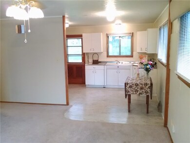 Open concept eat-in kitchen. Stove & fridge stay!