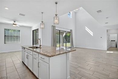 11484 Canopy Loop, Miromar Lakes, FL 33913 - photo 4