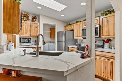 Kitchen with appliances with stainless steel finis