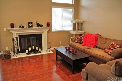 Spacious living area centered around a cozy firepl