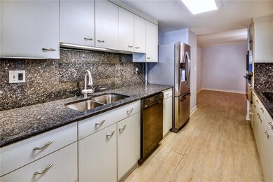 Kitchen - 18 x 8 - Granite Countertops and Backspl